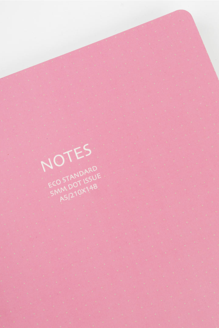 Pink notebook with 'NOTES' text on a white background
