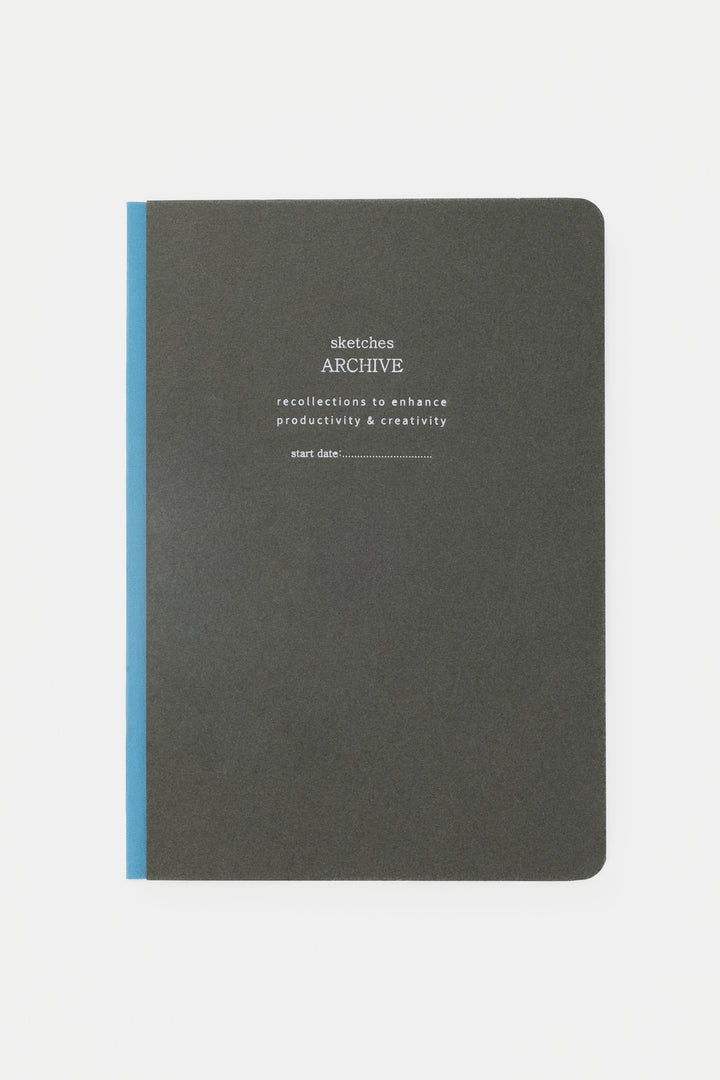 Gray sketchbook with blue spine 