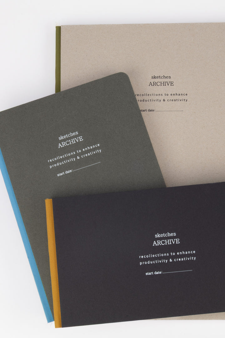Three sketchbooks with 'sketches ARCHIVE' branding 
