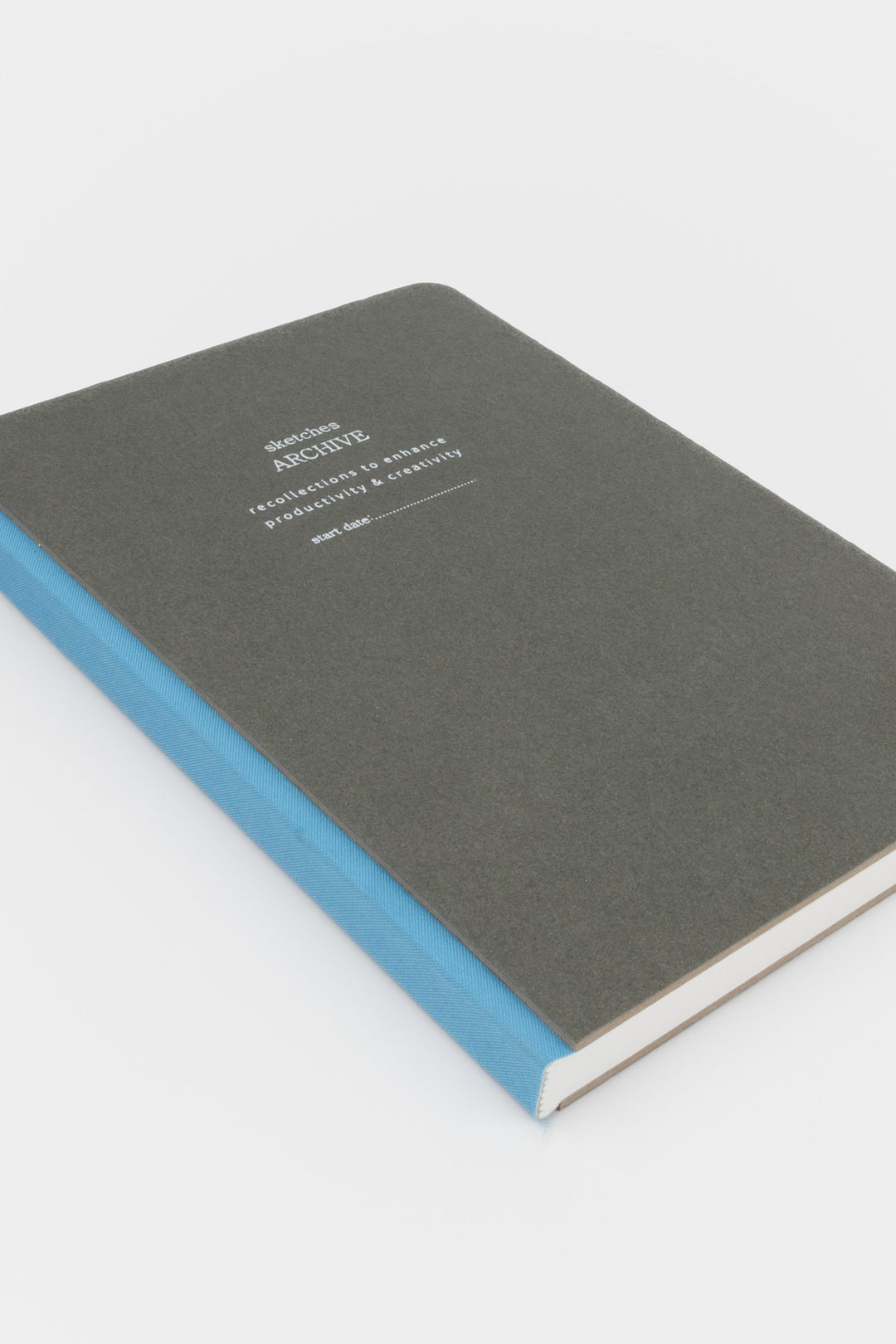 Grey sketchbook with blue binding 