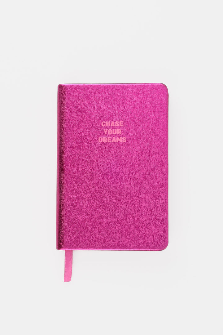 Closed pink metallic A6 notebook with chase your dreams text
