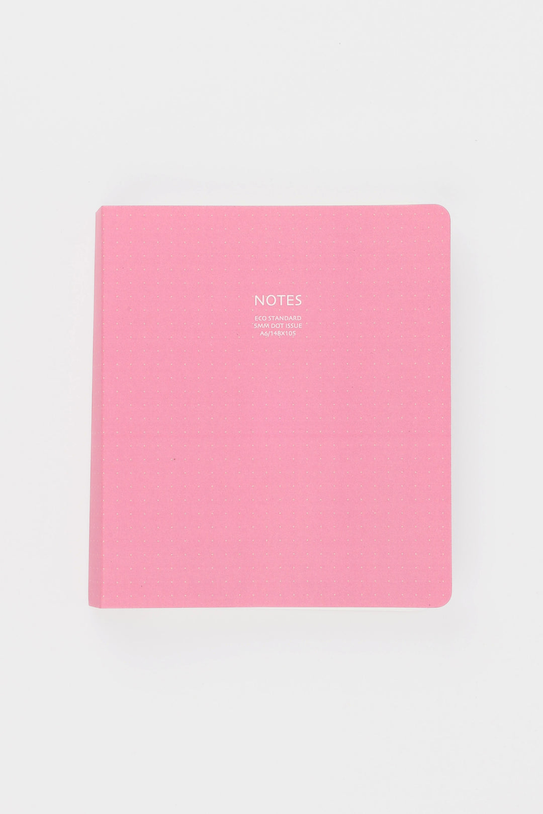 Pink notebook with 'NOTES' text on a white background