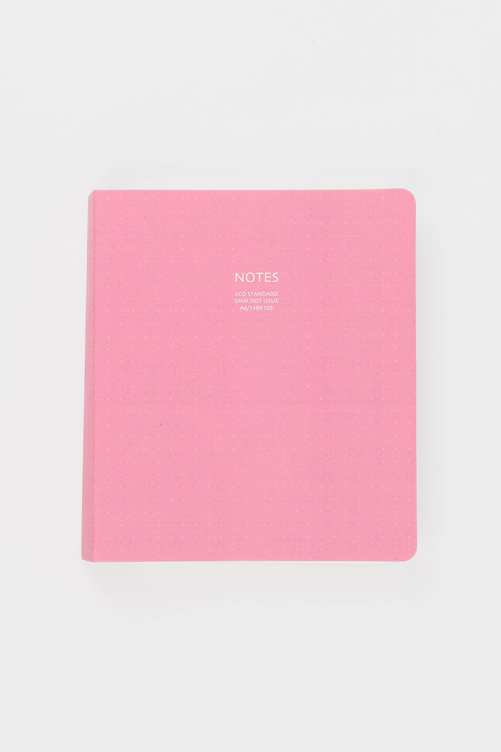 Pink notebook with 'NOTES' text on a white background