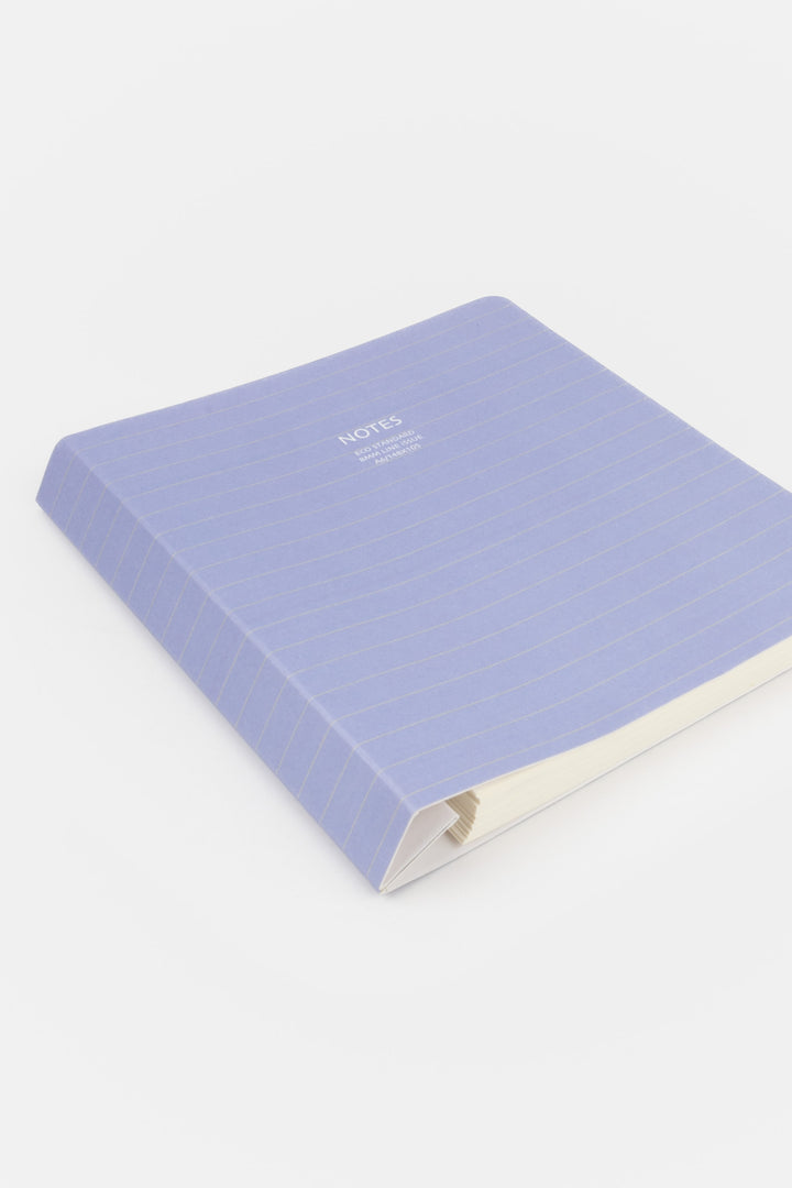 Purple notebook on a white background