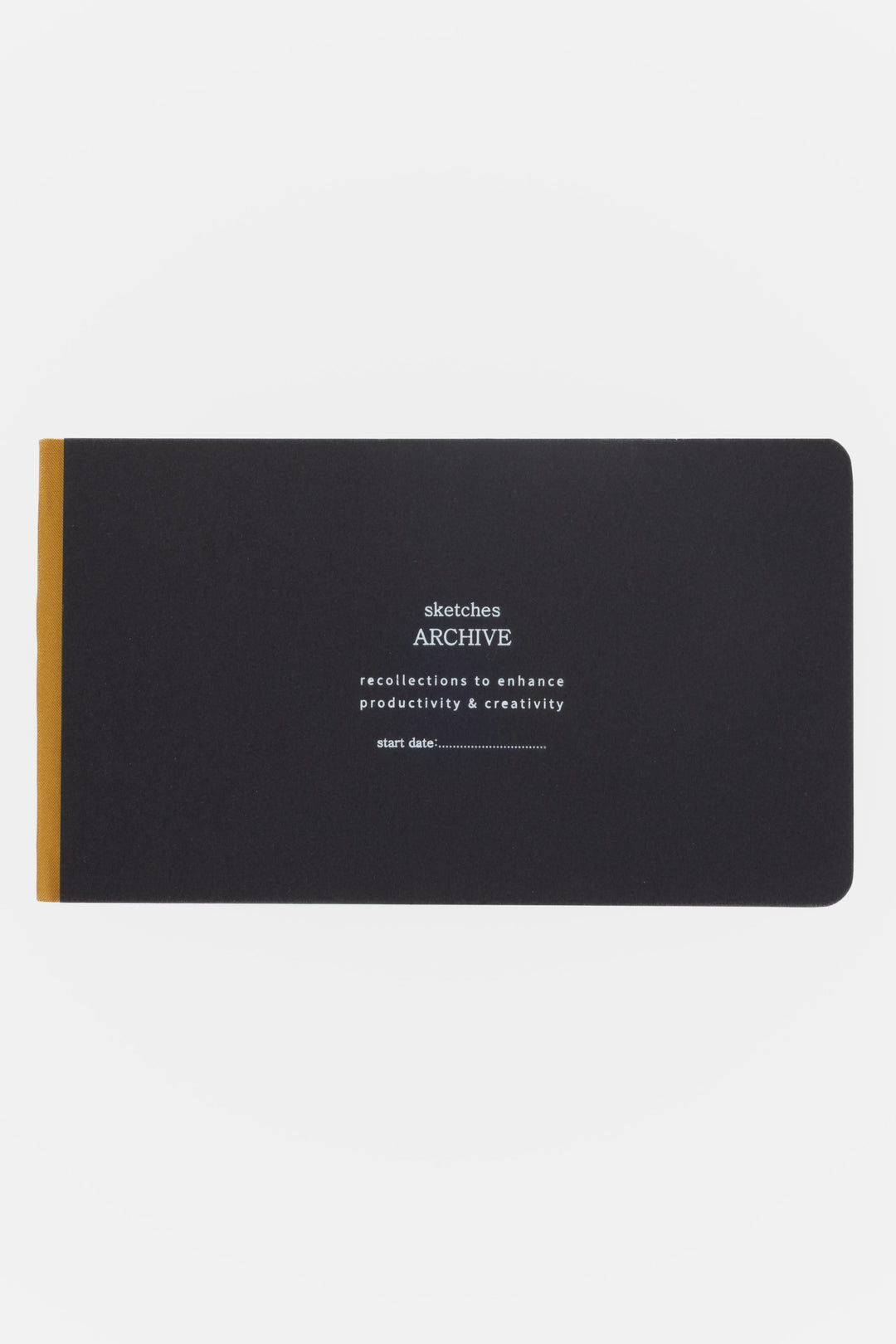 Black sketchbook with white text and gold spine