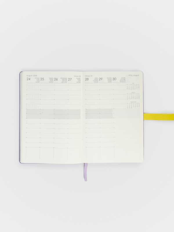 Calendar planner with a yellow ribbon on a white background