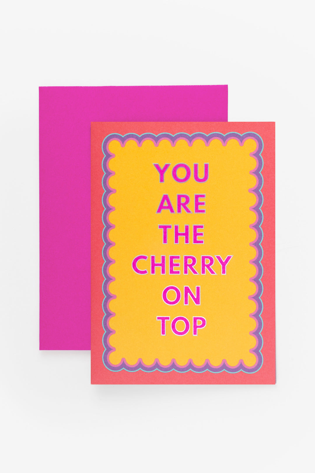 greeting card you are the cherry on top placed on bright pink envelope