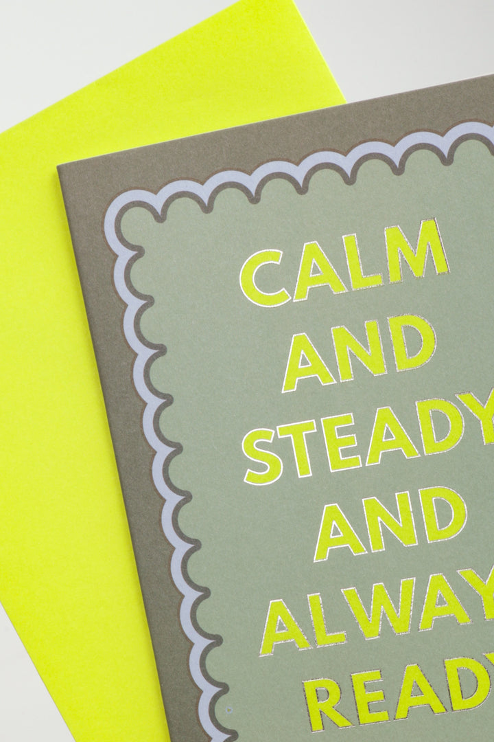 Card with motivational text 'CALM AND STEADY AND ALWAYS READy' on a green background