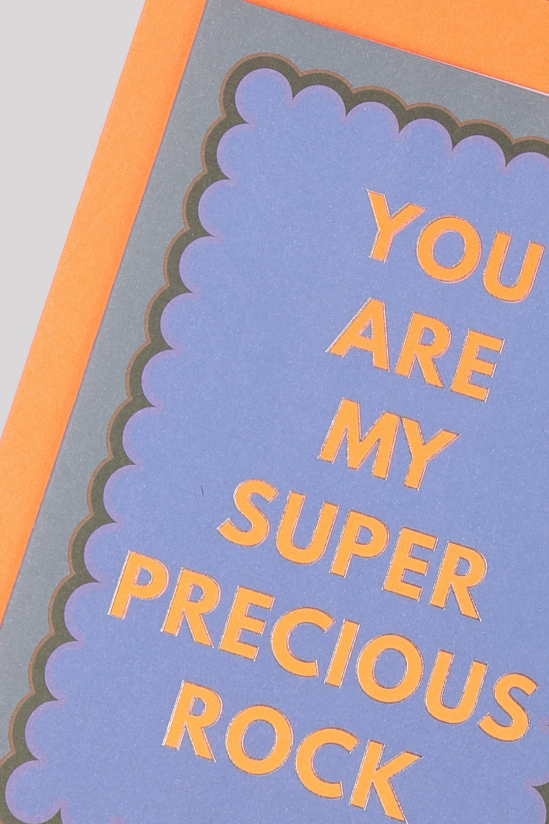 Card with 'You are my super precious rock' text on a blue and orange background