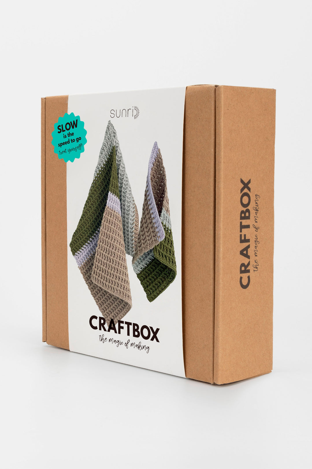 CraftBox packaging with crocheted triangle blankets on a white background