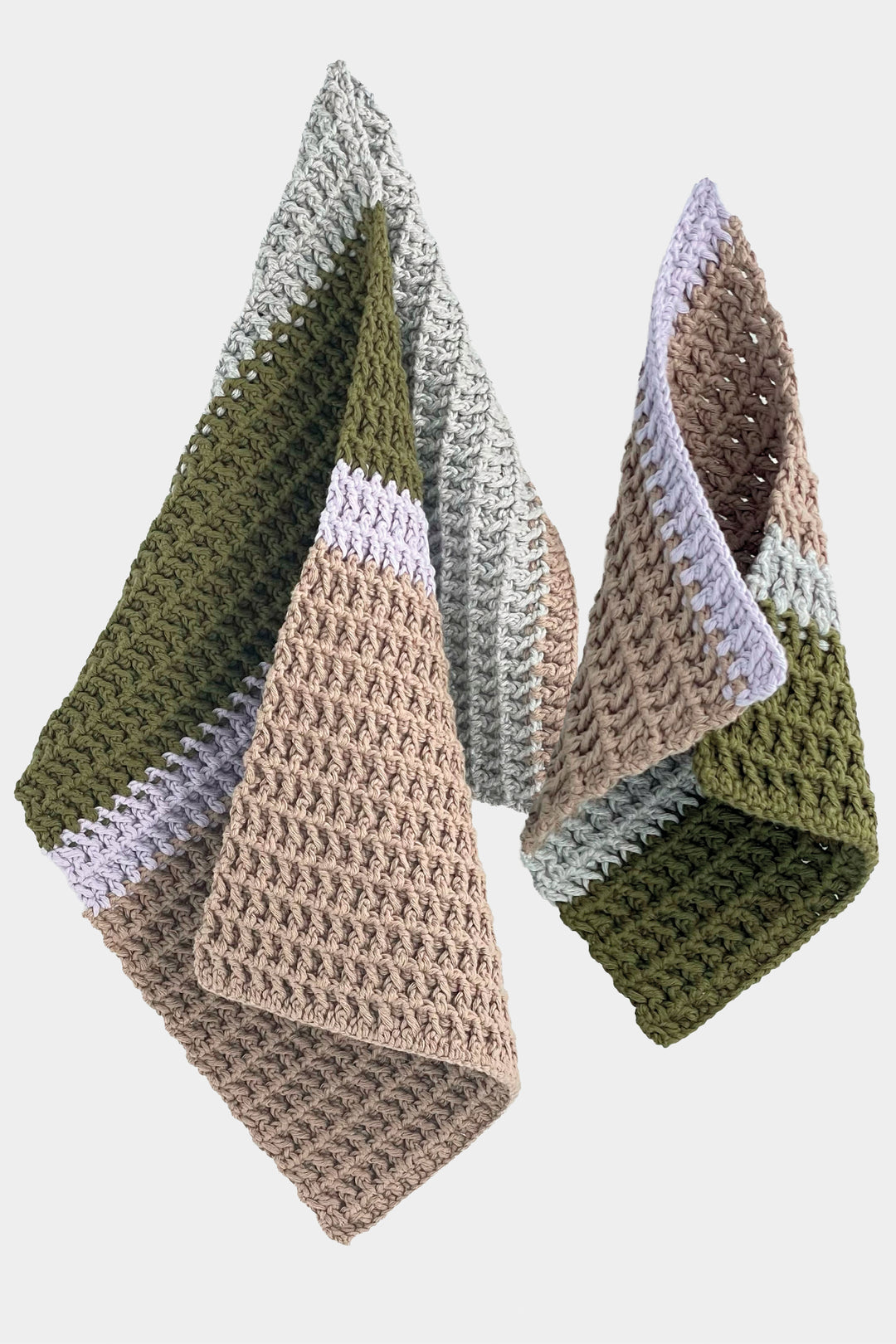 Three crocheted triangular guest towels in green, brown, and gray on a white background