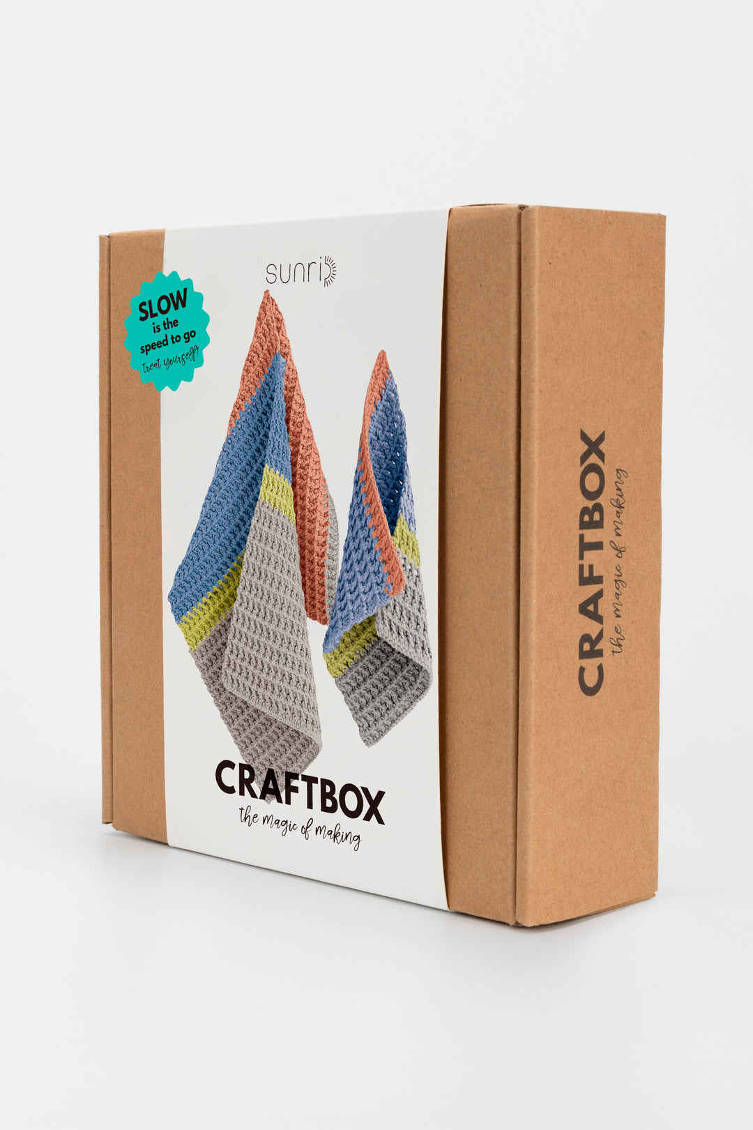 CraftBox packaging with colorful knitted items on a white background