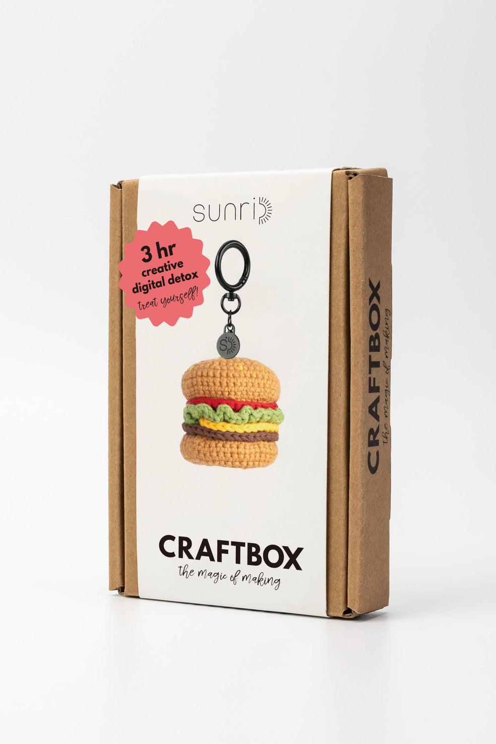 CraftBox packaging with a keychain shaped like a hamburger on a white background