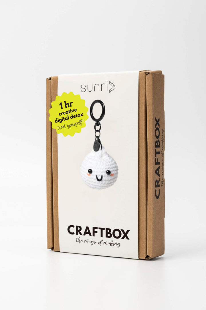 Craft box with a keychain and branding on a white background