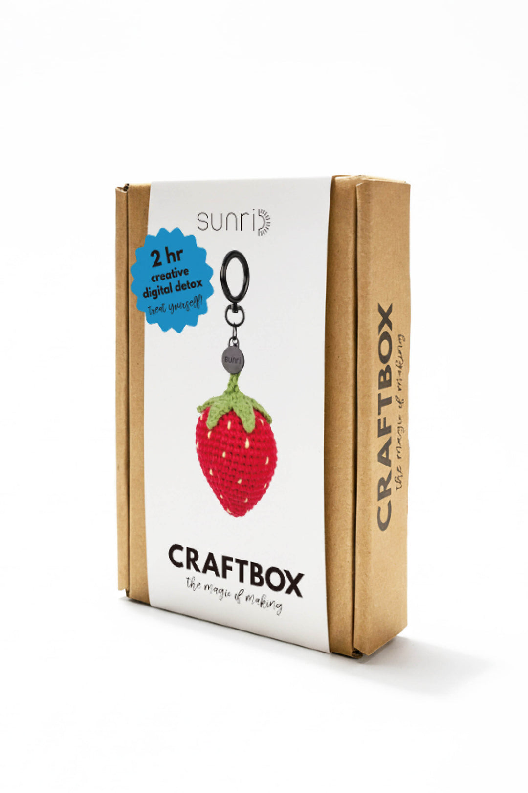 Craft box with strawberry keychain design on a white background
