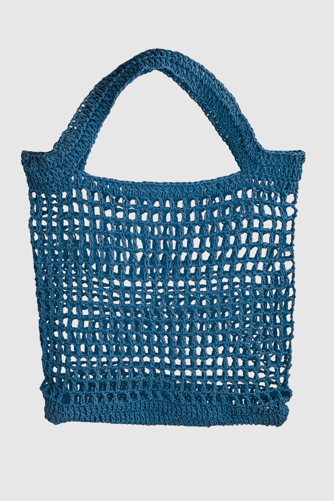 Blue crochet handbag on a light gray background