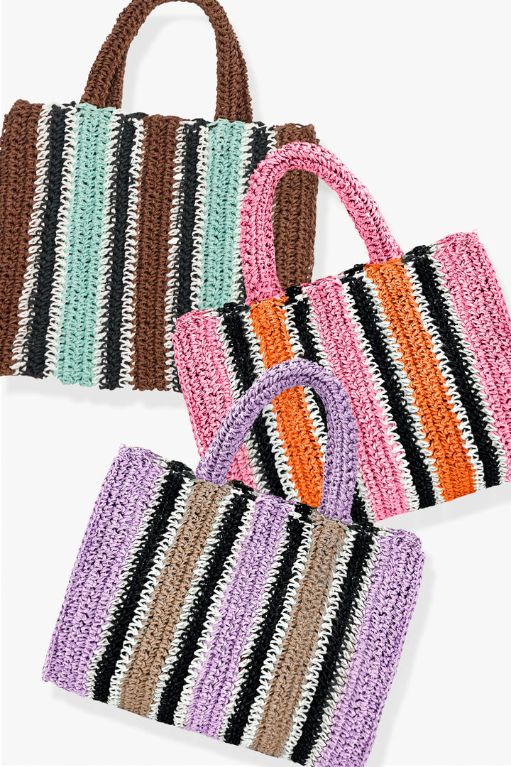 Set of colorful striped handbags on a white background