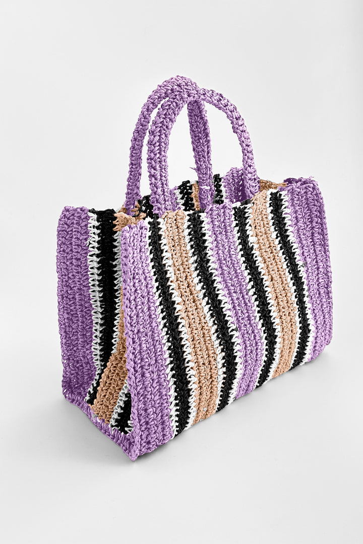 Striped handbag with purple handle and body on a white background