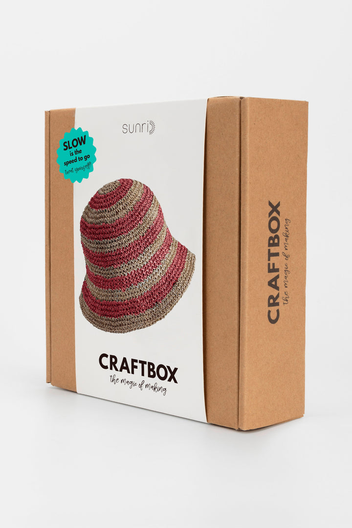 CraftBox packaging with a crochet hat on a white background