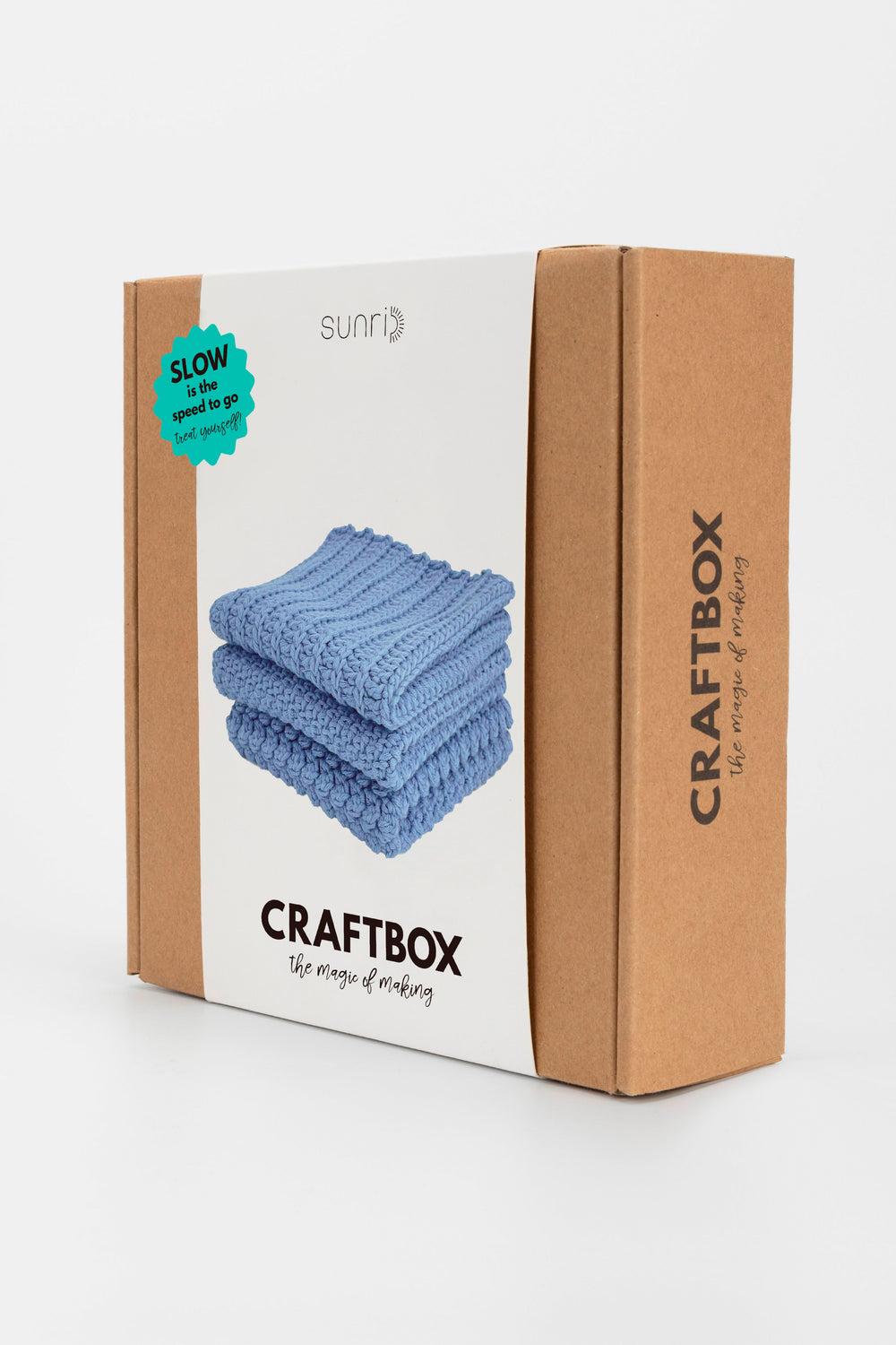 Craftbox packaging with blue fabric on a white background