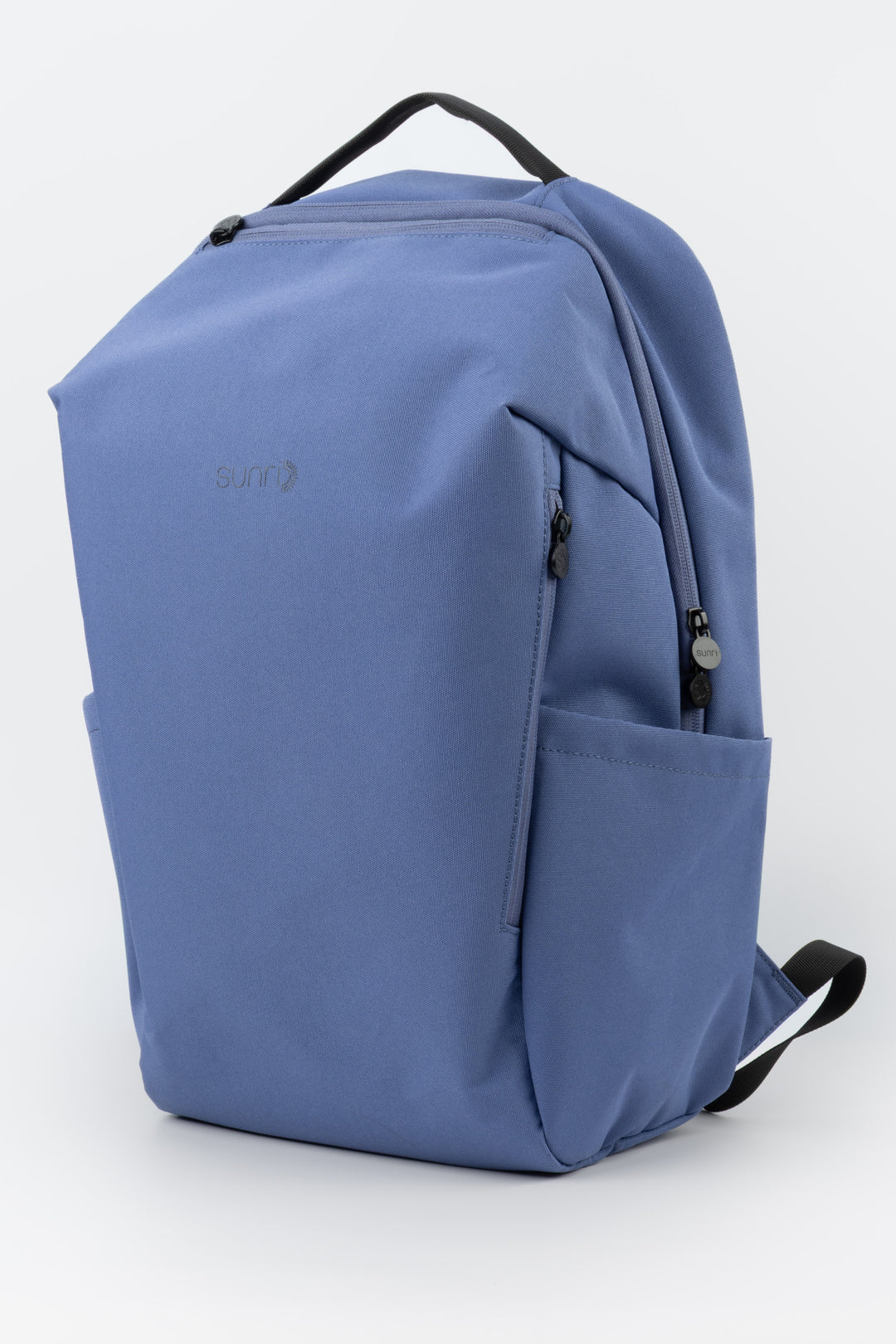 blue laptop backpack three quarter front view with side pockets and sunri zipper pulls
