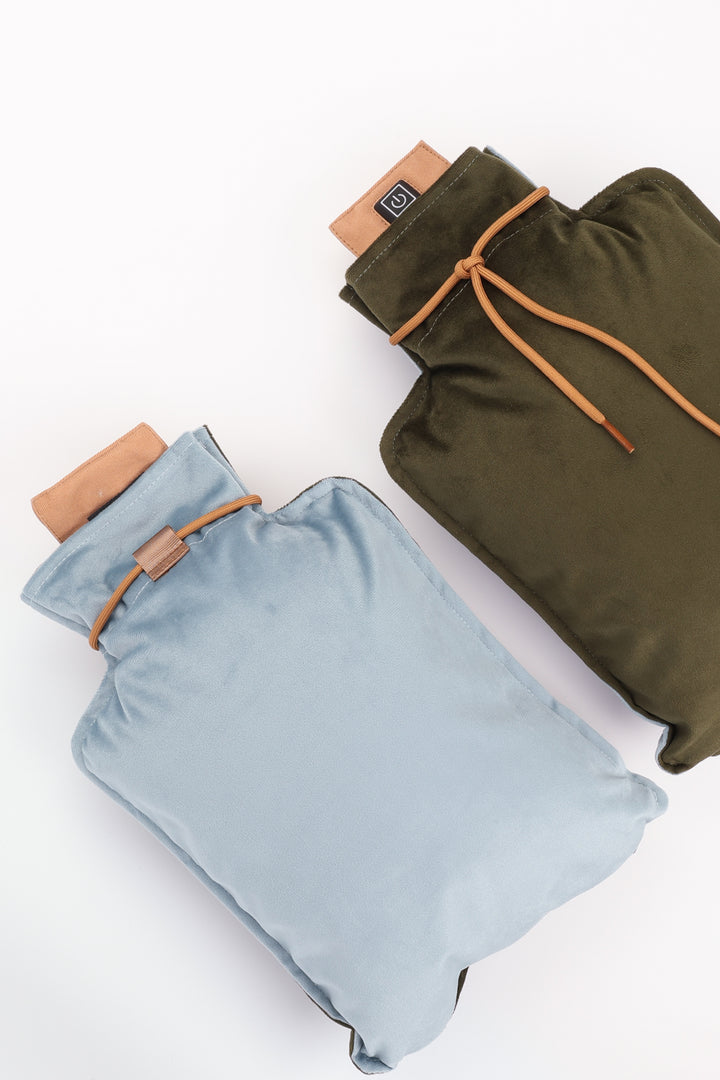 Both sides of duo-tone hot water bottles, one blue and one green, on a white background.