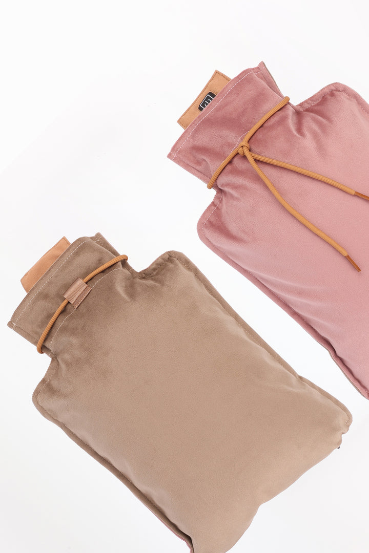 both side of e-heating pillow, one brown and one pink side, on a white background.