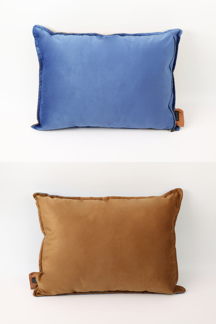 Blue and brown pillows on a white background