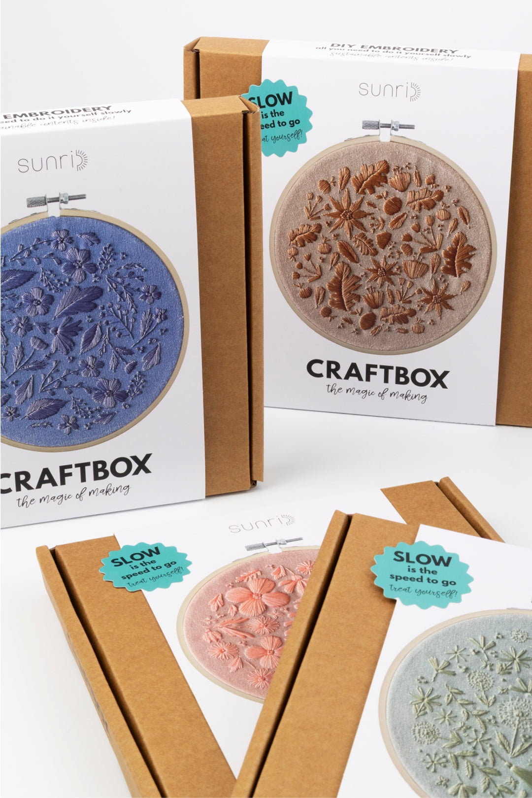 Sunlit CraftBox packaging with floral designs on a white background