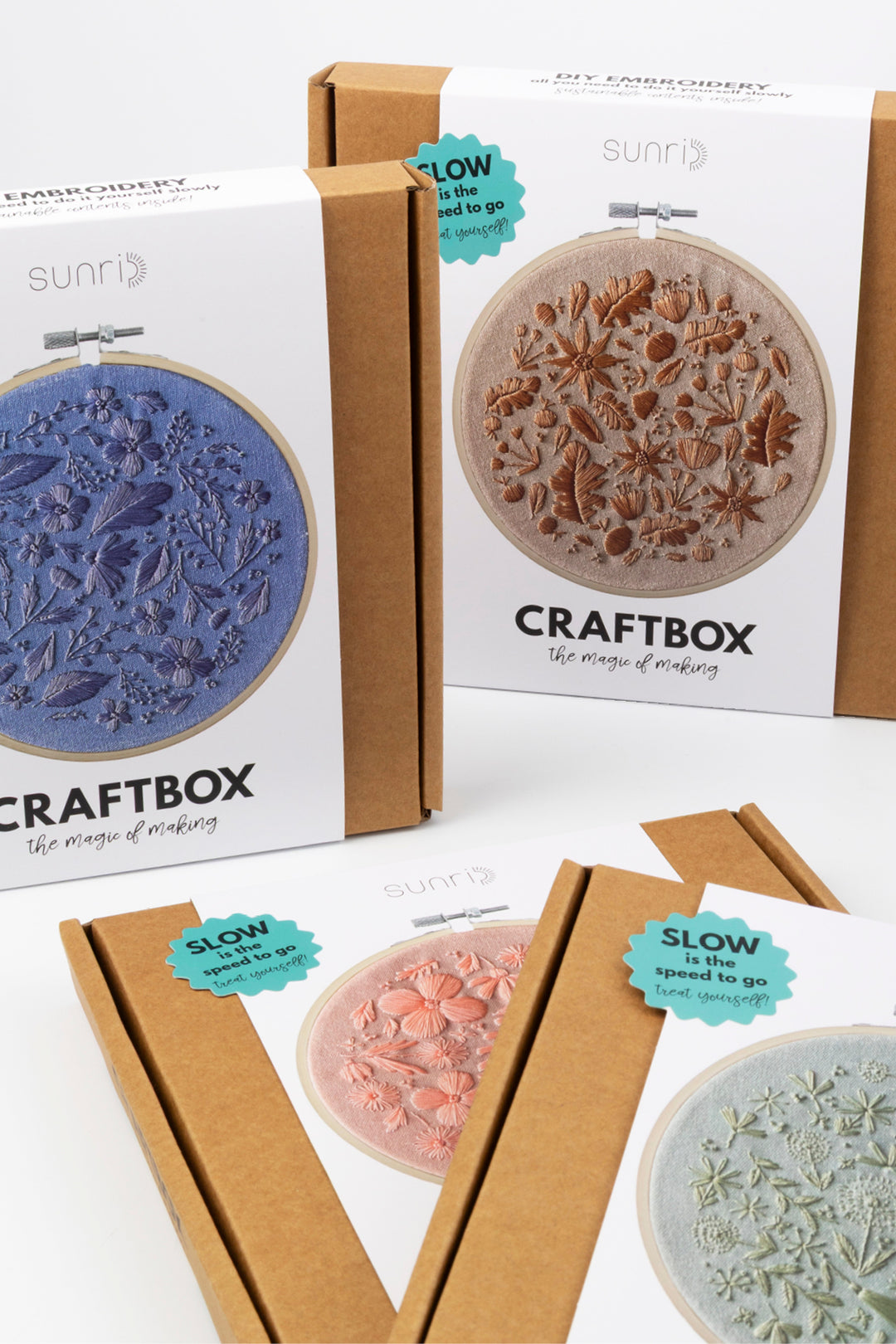 Sunri Craftbox packaging with multiple embroidery kit designs on a white background