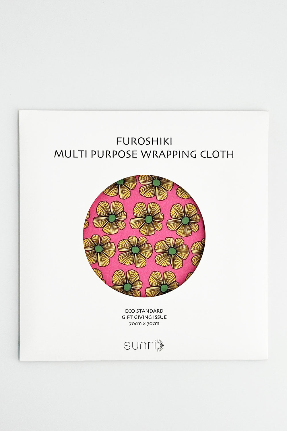 furoshiki wrapping cloth packaging with pink floral print and circular fabric sample