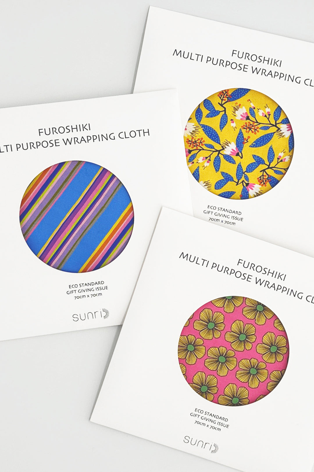 furoshiki wrapping cloth packaging cards with circular fabric samples in stripe and floral prints
