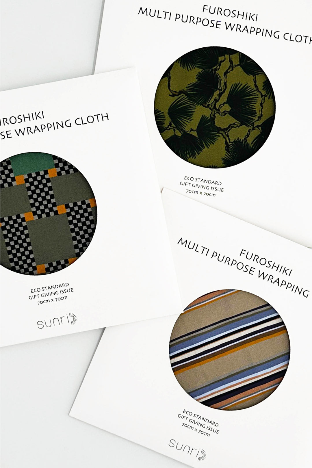 furoshiki packaging cards displaying graphic check, striped and botanical fabric variations