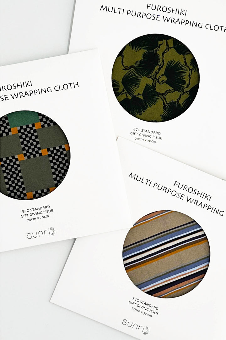 furoshiki packaging cards displaying natural striped and floral fabric designs