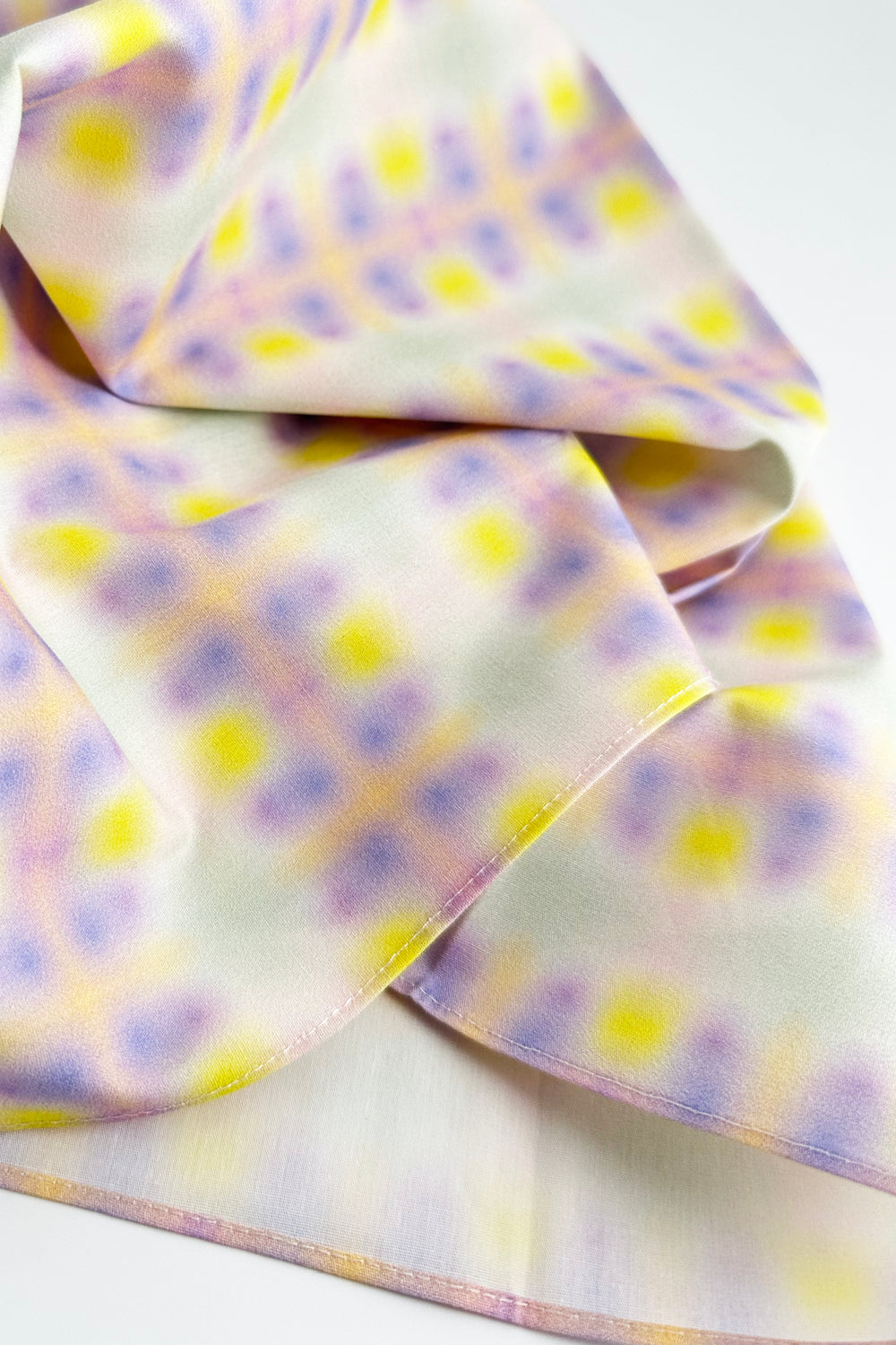 folded furoshiki fabric showing blended gradient colors