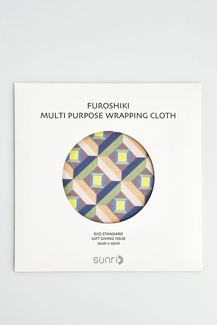 Furoshiki multi-purpose wrapping cloth with optic geometric pattern folded in packaging