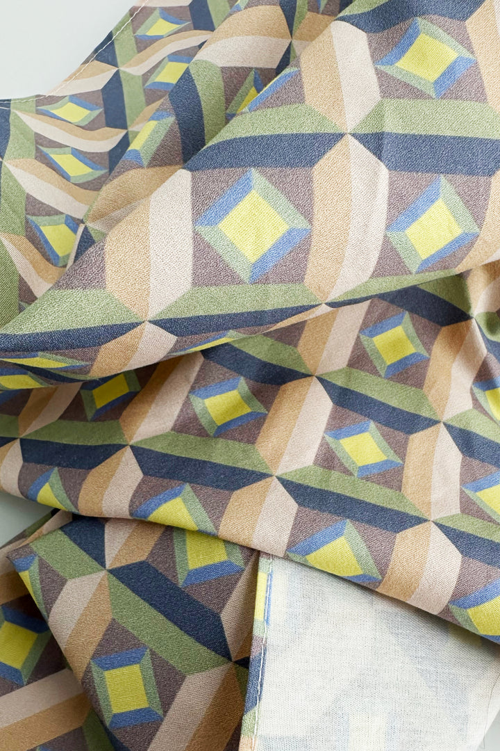 Close-up of furoshiki fabric showing optic geometric pattern and texture