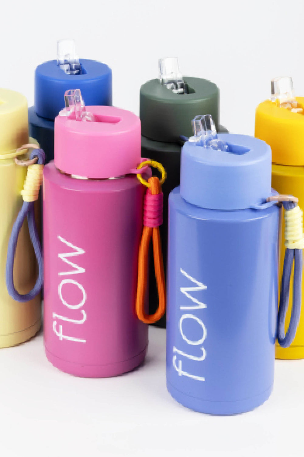group of 1l insulated flow bottles in multiple colours with paracord loops
