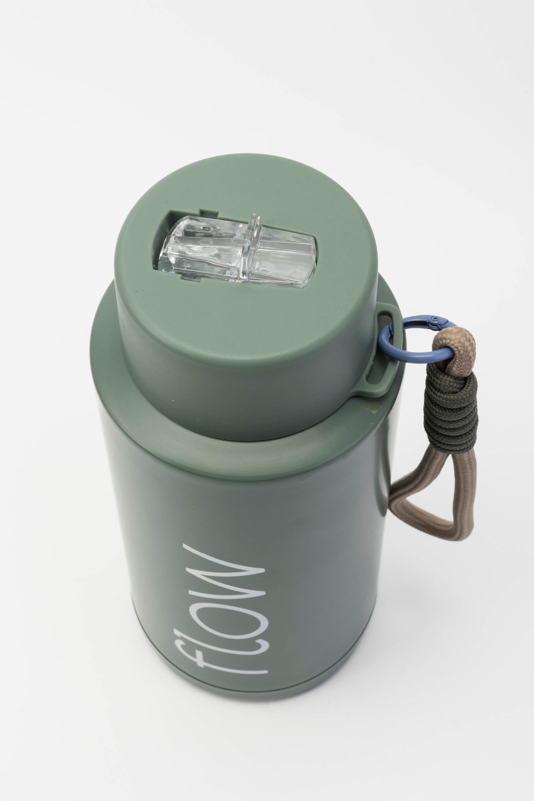 top view of flip mouthpiece on green insulated flow bottle
