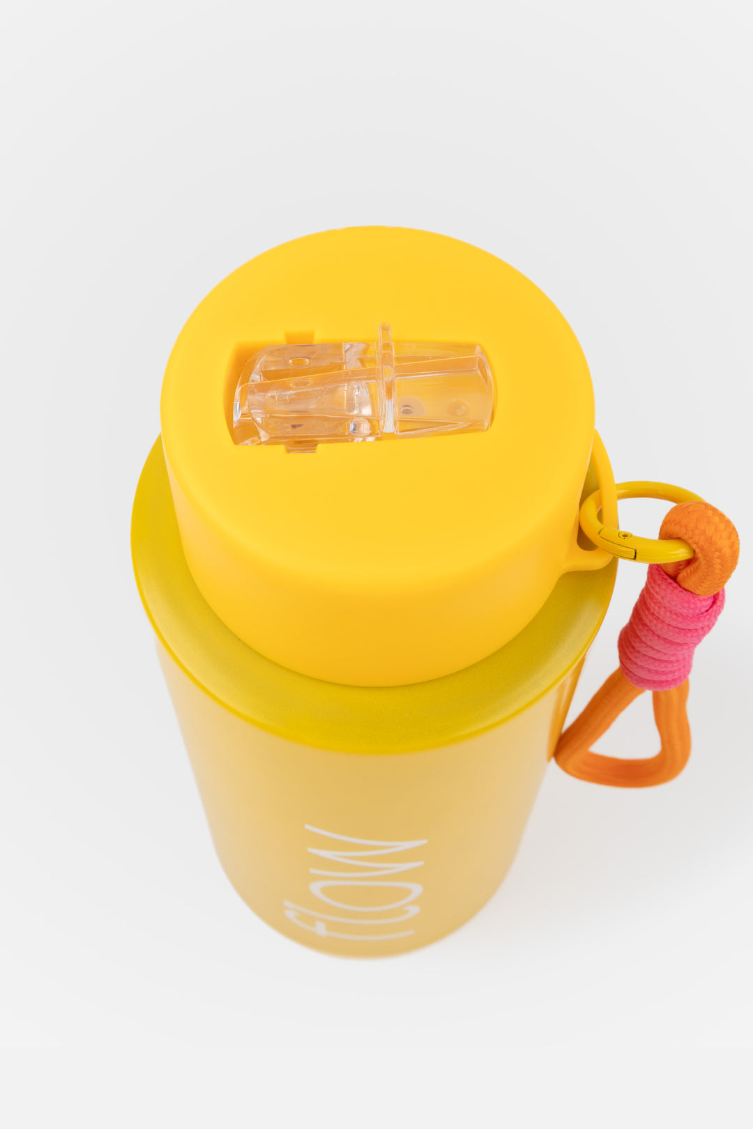 top view of flip mouthpiece on deep yellow insulated flow bottle
