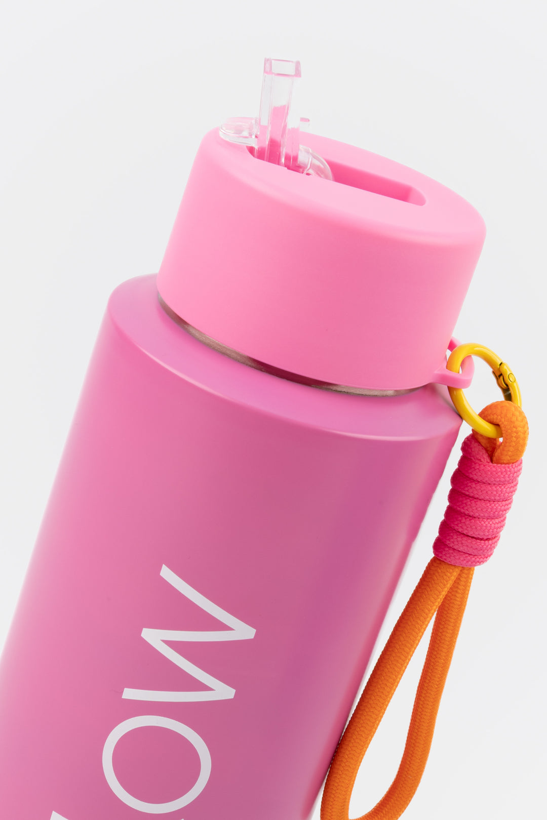 close up of flip mouthpiece on pink insulated flow bottle
