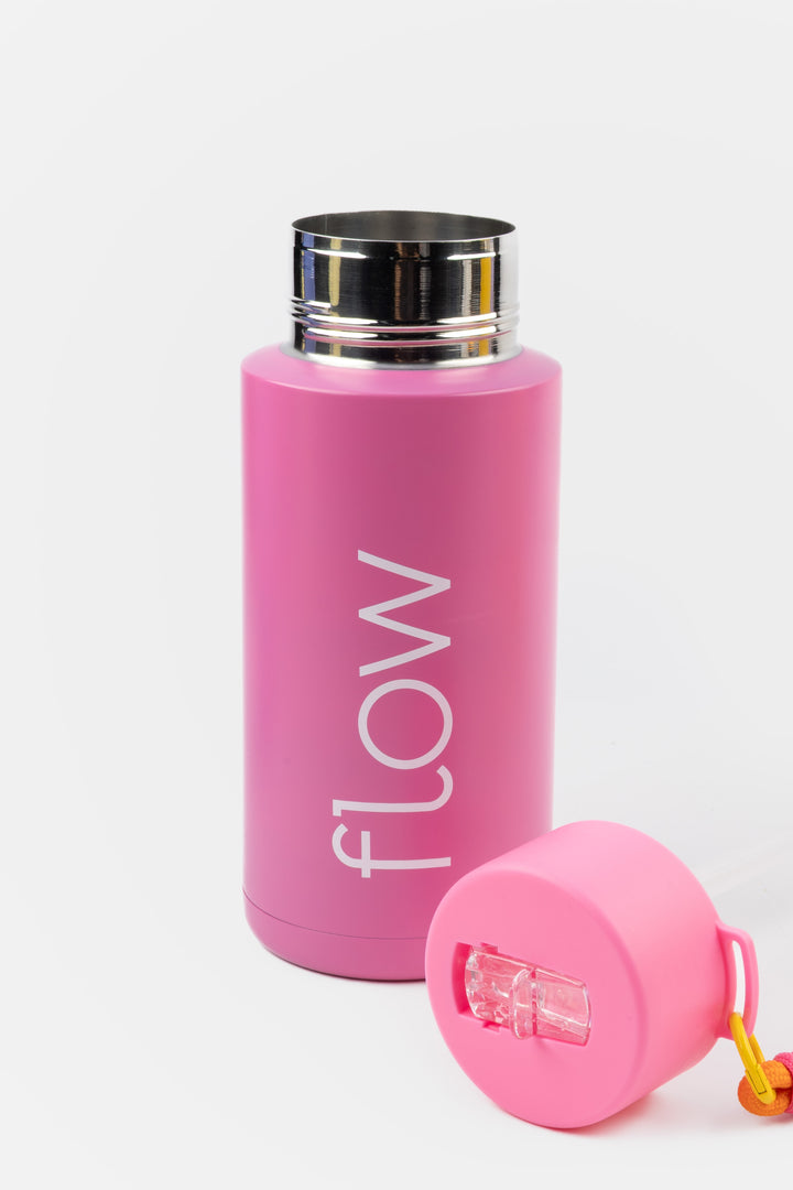 pink insulated flow bottle with lid removed showing wide opening