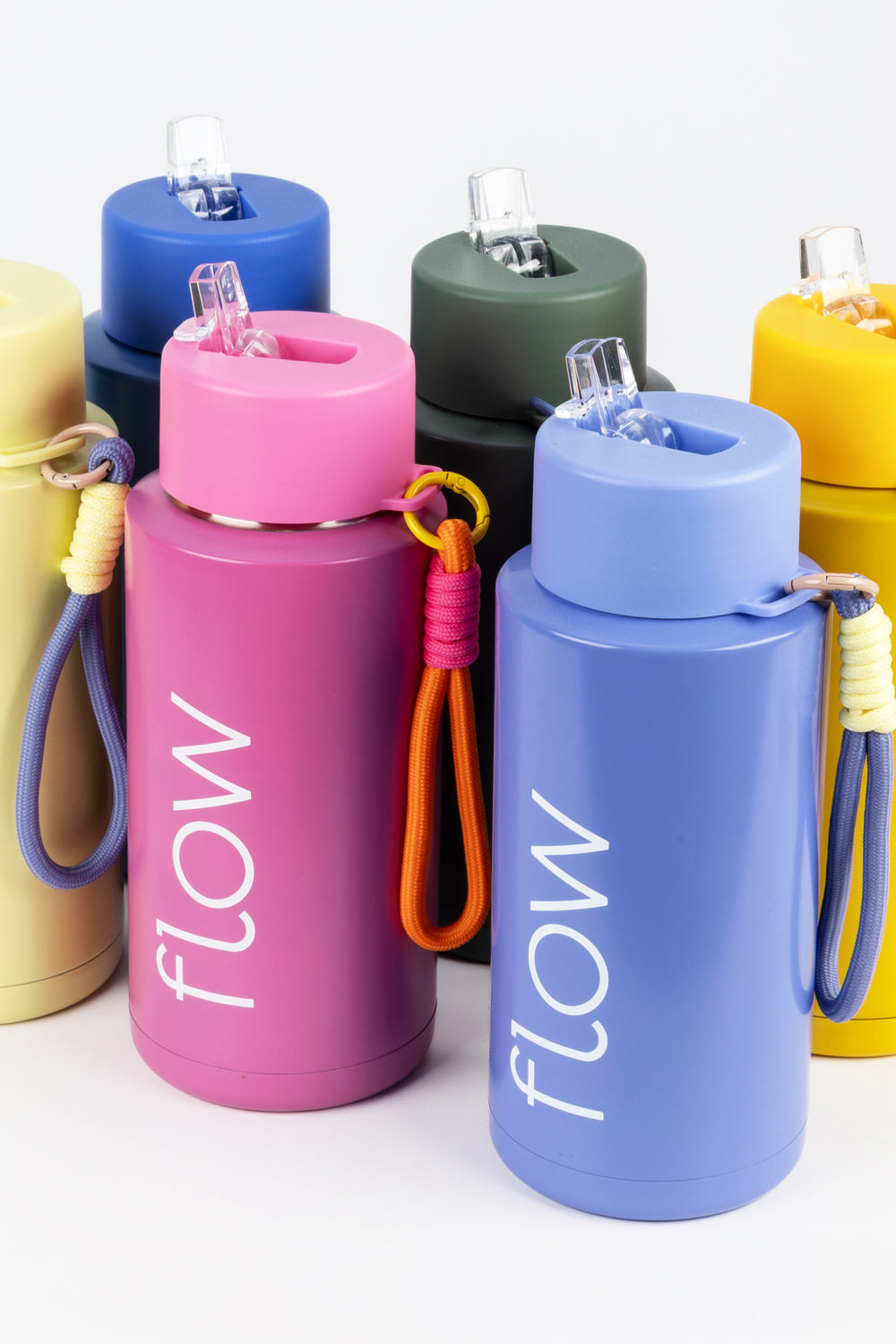 group of 1l insulated flow bottles in multiple colours with paracord loops
