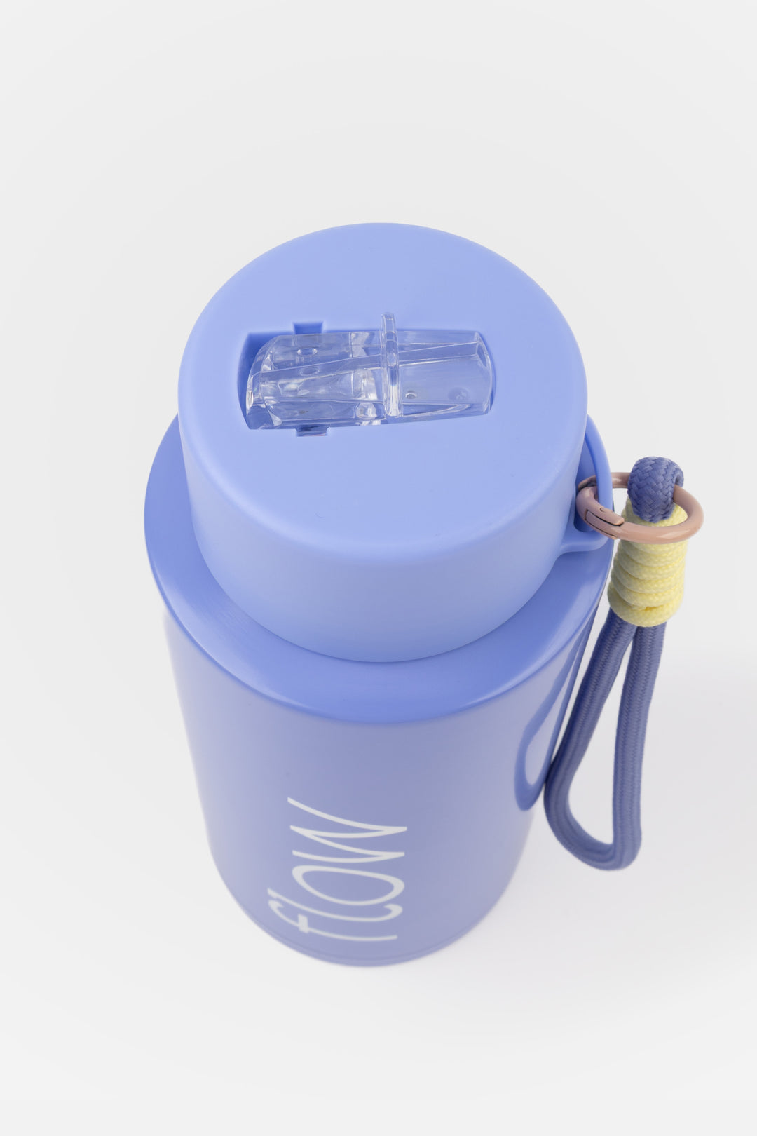 top view of flip mouthpiece on purple insulated flow bottle
