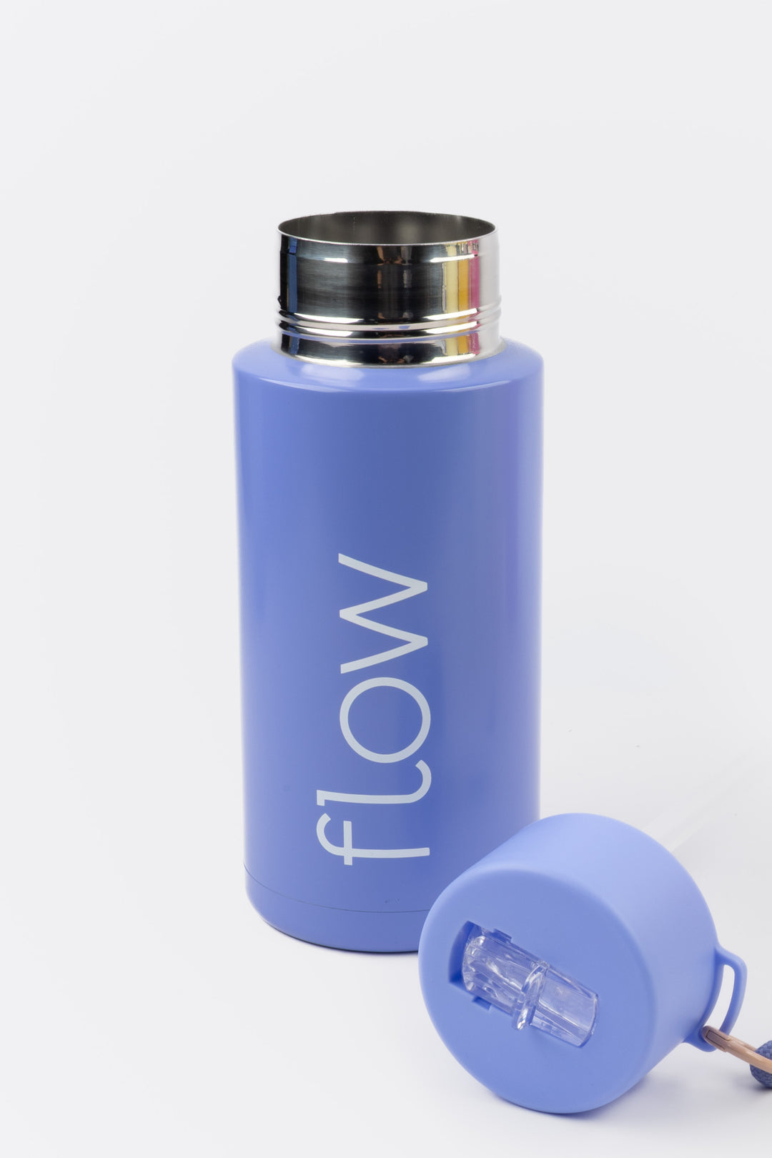 purple insulated flow bottle with lid removed showing wide opening