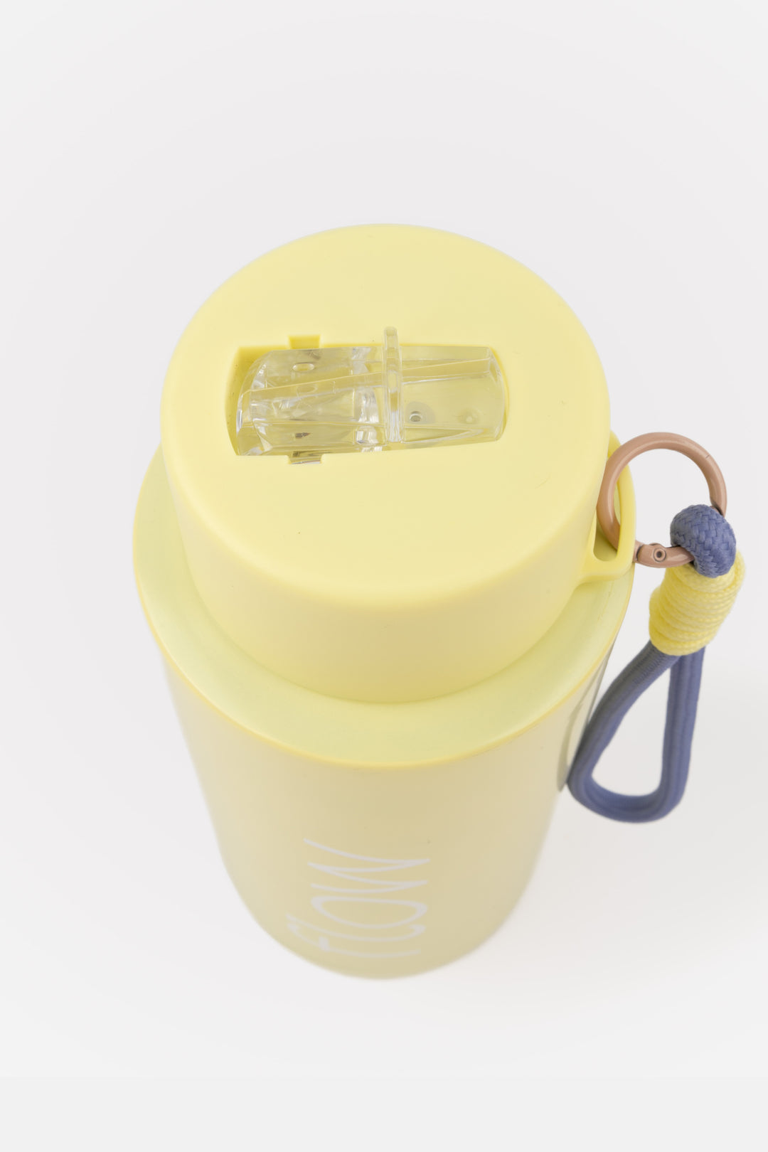 top view of flip mouthpiece on yellow insulated flow bottle
