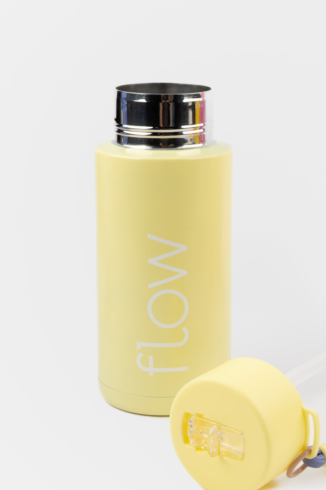 yellow insulated flow bottle with lid removed showing wide opening