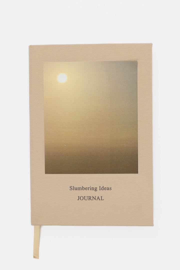 A5 RPET journal with a beige cover featuring a warm sunrise print and 鈥淪lumbering Ideas鈥?text.