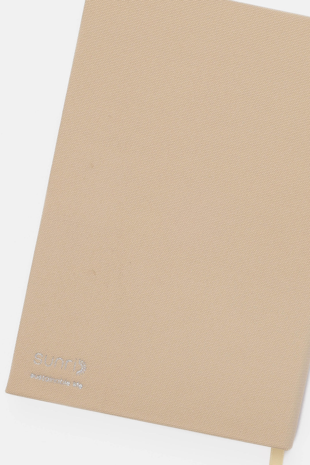 Beige backside of journal with SUNRI brand logo 