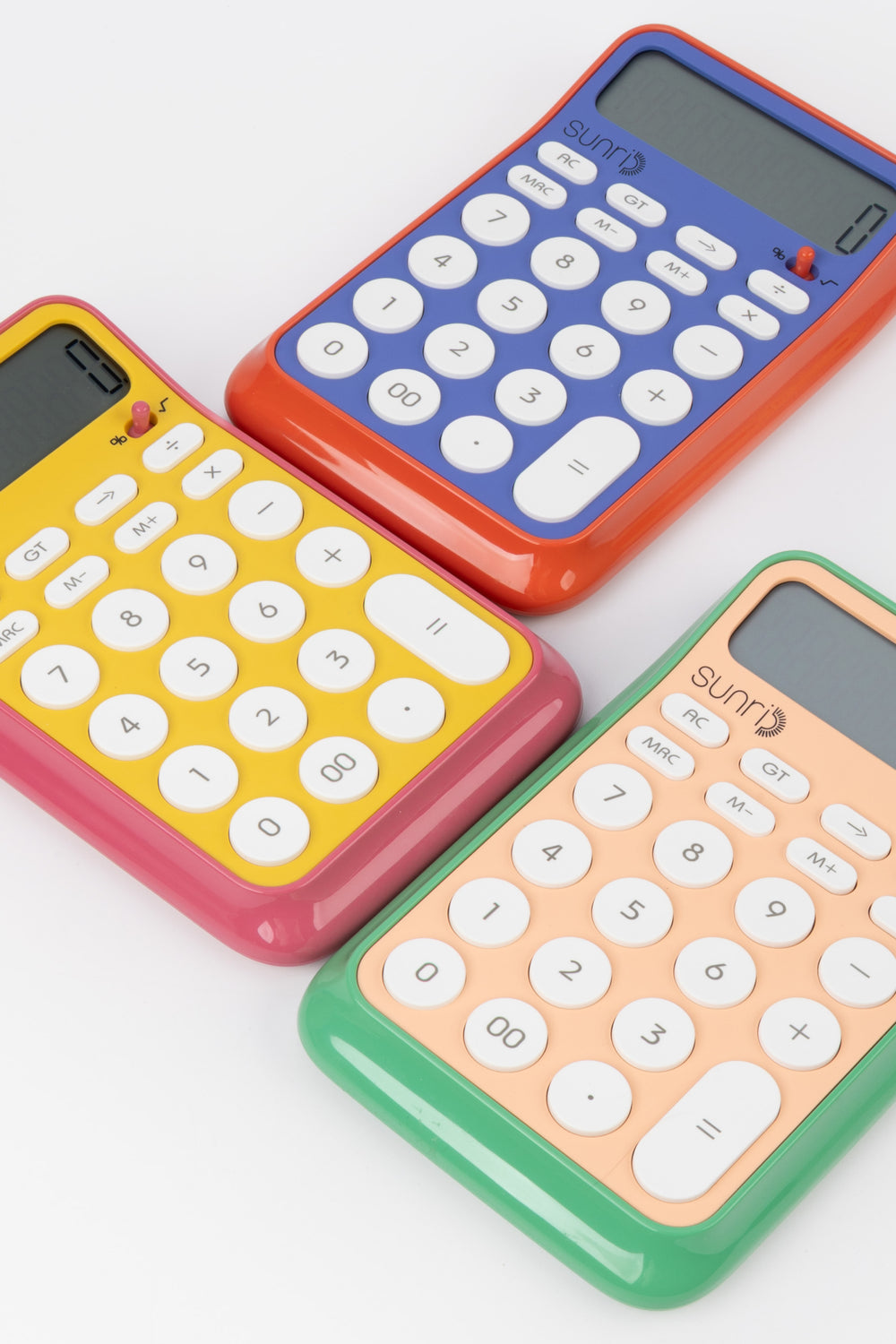 Three colorful calculators with different colored frames on a white background